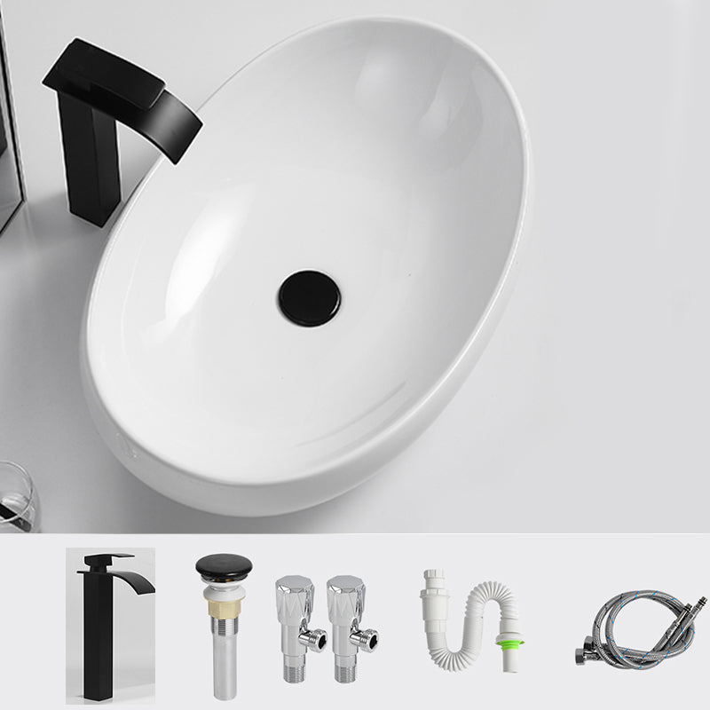 Luxury Bathroom Sink Ceramic Oval White Basin Drain Assembly Bathroom Sink 25"L x 17"W x 6"H Black Waterfall Comes Out Clearhalo 'Bathroom Remodel & Bathroom Fixtures' 'Bathroom Sinks & Faucet Components' 'Bathroom Sinks' 'bathroom_sink' 'Home Improvement' 'home_improvement' 'home_improvement_bathroom_sink' 6743453