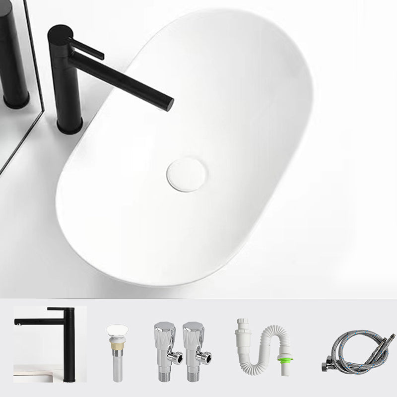 Luxury Bathroom Sink Ceramic Oval White Basin Drain Assembly Bathroom Sink 24"L x 14.2"W x 6.3"H Black Non-pull Clearhalo 'Bathroom Remodel & Bathroom Fixtures' 'Bathroom Sinks & Faucet Components' 'Bathroom Sinks' 'bathroom_sink' 'Home Improvement' 'home_improvement' 'home_improvement_bathroom_sink' 6743464