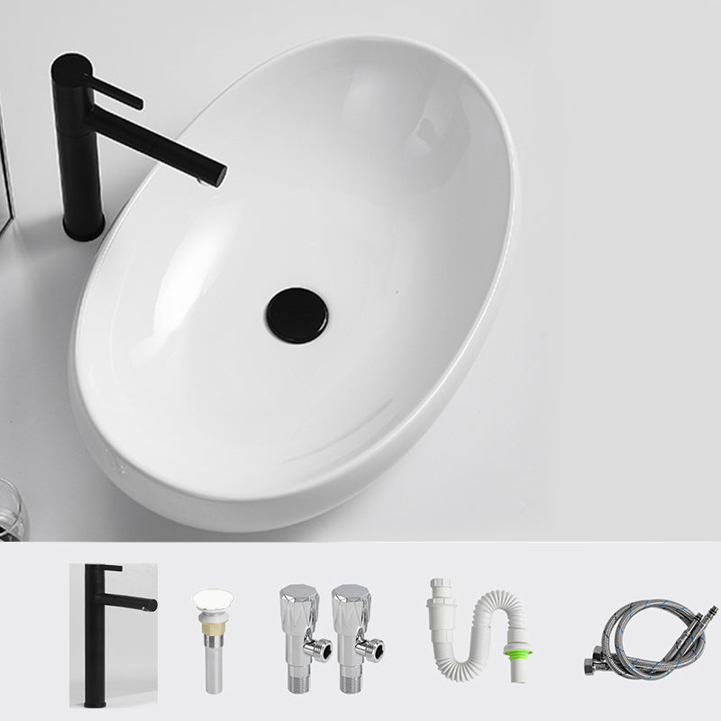 Luxury Bathroom Sink Ceramic Oval White Basin Drain Assembly Bathroom Sink 25"L x 17"W x 6"H Black Non-pull Clearhalo 'Bathroom Remodel & Bathroom Fixtures' 'Bathroom Sinks & Faucet Components' 'Bathroom Sinks' 'bathroom_sink' 'Home Improvement' 'home_improvement' 'home_improvement_bathroom_sink' 6743465