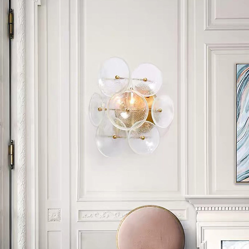 Clear Textured Glass Circle Sconce Minimalism 2 Bulbs Wall Mounted Light Fixture for Living Room Clearhalo 'Cast Iron' 'Glass' 'Industrial' 'Modern wall lights' 'Modern' 'Tiffany' 'Traditional wall lights' 'Wall Lamps & Sconces' 'Wall Lights' Lighting' 678324