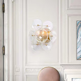 Clear Textured Glass Circle Sconce Minimalism 2 Bulbs Wall Mounted Light Fixture for Living Room Clearhalo 'Cast Iron' 'Glass' 'Industrial' 'Modern wall lights' 'Modern' 'Tiffany' 'Traditional wall lights' 'Wall Lamps & Sconces' 'Wall Lights' Lighting' 678324