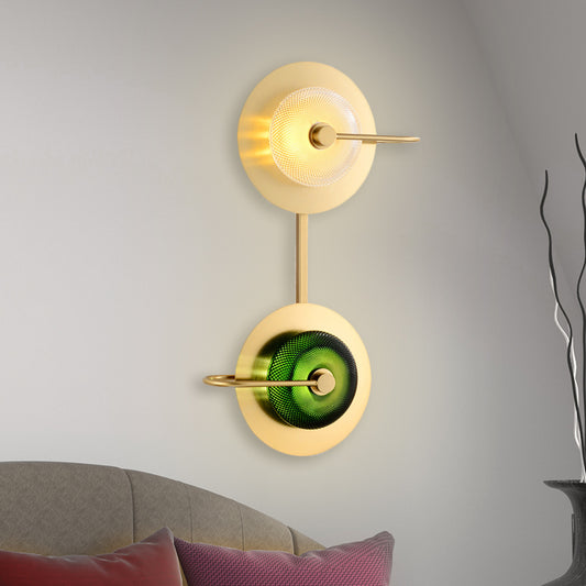 Doughnut Bedside Sconce Light Clear and Green Lattice Glass LED Modernist Wall Lamp in Brass with 2-Disk Detail Green Clearhalo 'Cast Iron' 'Glass' 'Industrial' 'Modern wall lights' 'Modern' 'Tiffany' 'Traditional wall lights' 'Wall Lamps & Sconces' 'Wall Lights' Lighting' 678999