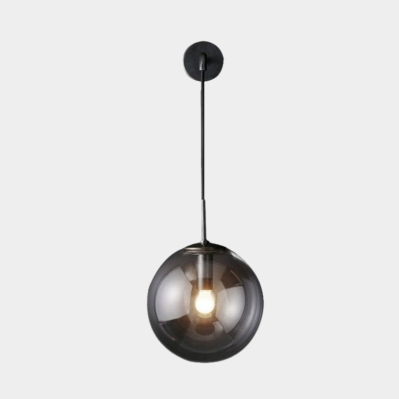Modern Spherical Wall Lighting Fixture 1 Bulb Smoked Glass Sconce Light in Black/Brass for Living Room, 8"/10" Clearhalo 'Cast Iron' 'Glass' 'Industrial wall lights' 'Industrial' 'Middle century wall lights' 'Modern' 'Tiffany' 'Traditional wall lights' 'Wall Lamps & Sconces' 'Wall Lights' Lighting' 679098