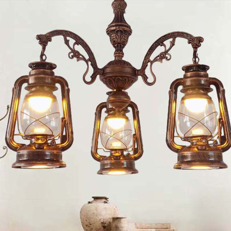 Clear Glass Black/Silver/Red Chandelier Light Lantern 3-Light Industrial Pendant Lamp for Kitchen Clearhalo 'Cast Iron' 'Ceiling Lights' 'Chandeliers' 'Industrial Chandeliers' 'Industrial' 'Metal' 'Middle Century Chandeliers' 'Rustic Chandeliers' 'Tiffany' Lighting' 679613