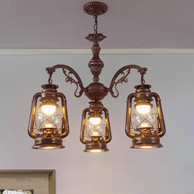 Clear Glass Black/Silver/Red Chandelier Light Lantern 3-Light Industrial Pendant Lamp for Kitchen Clearhalo 'Cast Iron' 'Ceiling Lights' 'Chandeliers' 'Industrial Chandeliers' 'Industrial' 'Metal' 'Middle Century Chandeliers' 'Rustic Chandeliers' 'Tiffany' Lighting' 679617