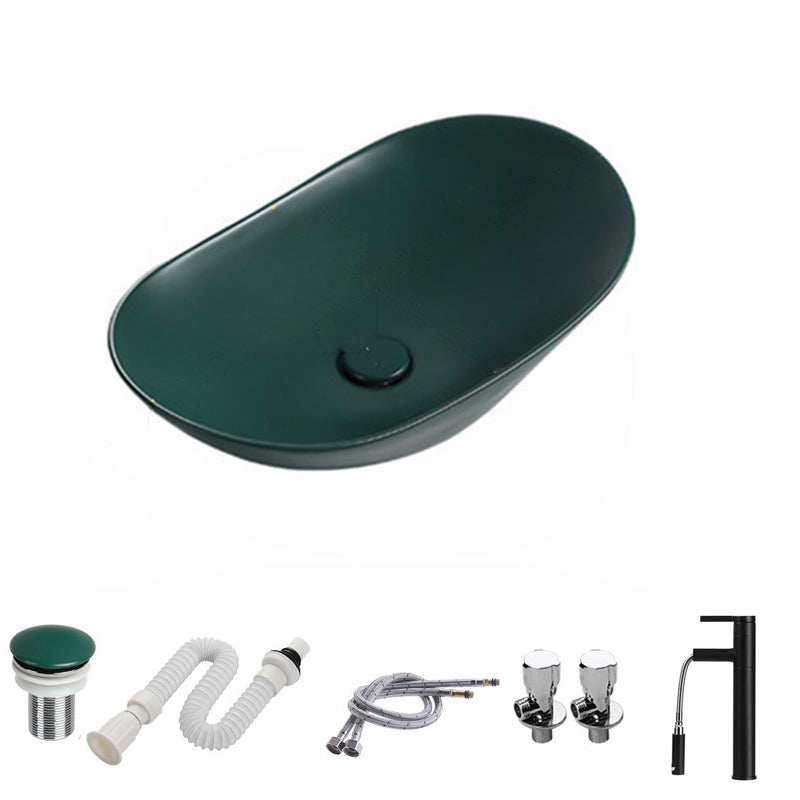Modern Vessel Bathroom Sink Porcelain Oval with Pop-Up Drain and Faucet Vessel Sink 23.6"L x 14.2"W x 5.9"H Blackish Green Pulling Clearhalo 'Bathroom Remodel & Bathroom Fixtures' 'Bathroom Sinks & Faucet Components' 'Bathroom Sinks' 'bathroom_sink' 'Home Improvement' 'home_improvement' 'home_improvement_bathroom_sink' 6818770