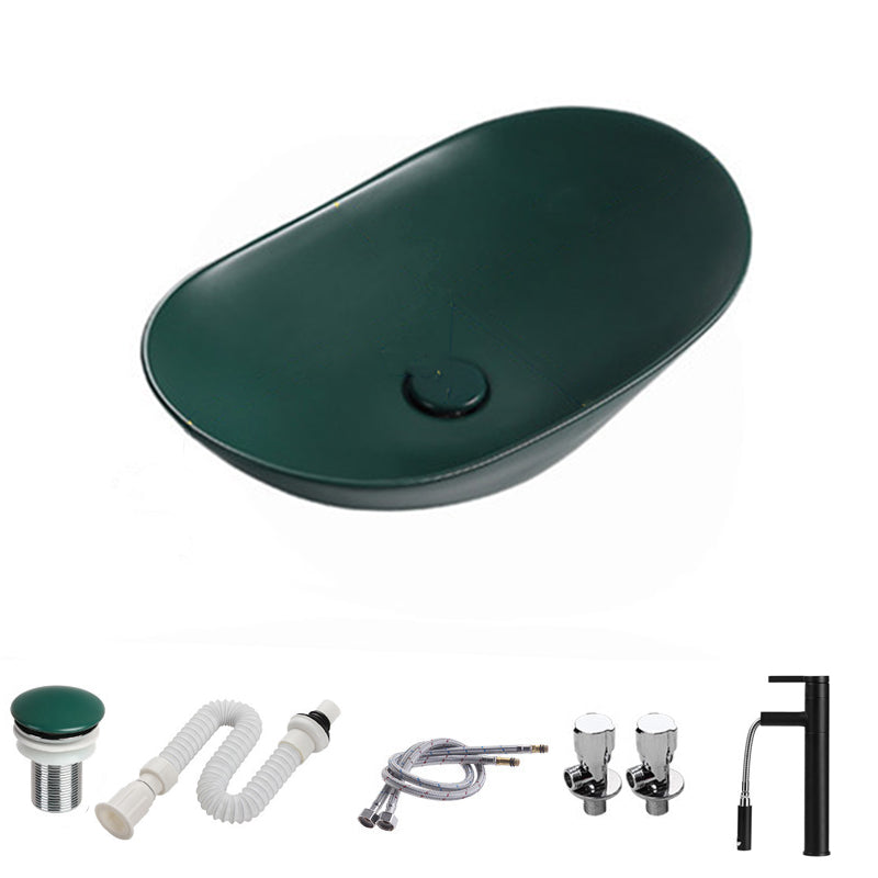 Modern Vessel Bathroom Sink Porcelain Oval with Pop-Up Drain and Faucet Vessel Sink 20.5"L x 12.8"W x 5.9"H Blackish Green Pulling Clearhalo 'Bathroom Remodel & Bathroom Fixtures' 'Bathroom Sinks & Faucet Components' 'Bathroom Sinks' 'bathroom_sink' 'Home Improvement' 'home_improvement' 'home_improvement_bathroom_sink' 6818771