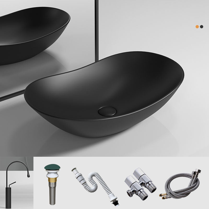 Oval Porcelain Vessel Sink Modern Style Vessel Lavatory Sink with No Craftsmanship Black Sink with Faucet Clearhalo 'Bathroom Remodel & Bathroom Fixtures' 'Bathroom Sinks & Faucet Components' 'Bathroom Sinks' 'bathroom_sink' 'Home Improvement' 'home_improvement' 'home_improvement_bathroom_sink' 6894681