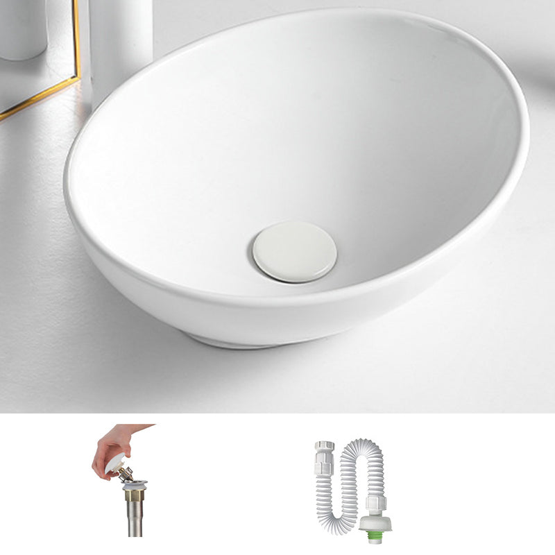 White Oval Vessel Sink Modern Style Porcelain Basin Sink with No Craftsmanship 16"L x 13"W x 6"H Sink Clearhalo 'Bathroom Remodel & Bathroom Fixtures' 'Bathroom Sinks & Faucet Components' 'Bathroom Sinks' 'bathroom_sink' 'Home Improvement' 'home_improvement' 'home_improvement_bathroom_sink' 6926820