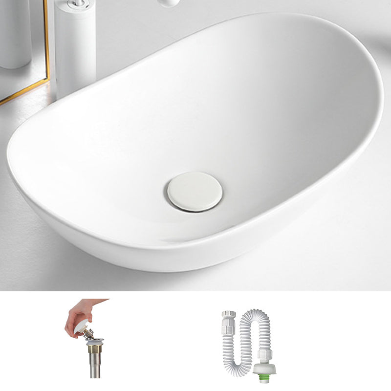 White Oval Vessel Sink Modern Style Porcelain Basin Sink with No Craftsmanship 20"L x 13"W x 6"H Sink Clearhalo 'Bathroom Remodel & Bathroom Fixtures' 'Bathroom Sinks & Faucet Components' 'Bathroom Sinks' 'bathroom_sink' 'Home Improvement' 'home_improvement' 'home_improvement_bathroom_sink' 6926821