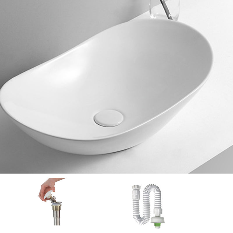 White Oval Vessel Sink Modern Style Porcelain Basin Sink with No Craftsmanship 24"L x 14"W x 6"H Sink Clearhalo 'Bathroom Remodel & Bathroom Fixtures' 'Bathroom Sinks & Faucet Components' 'Bathroom Sinks' 'bathroom_sink' 'Home Improvement' 'home_improvement' 'home_improvement_bathroom_sink' 6926823