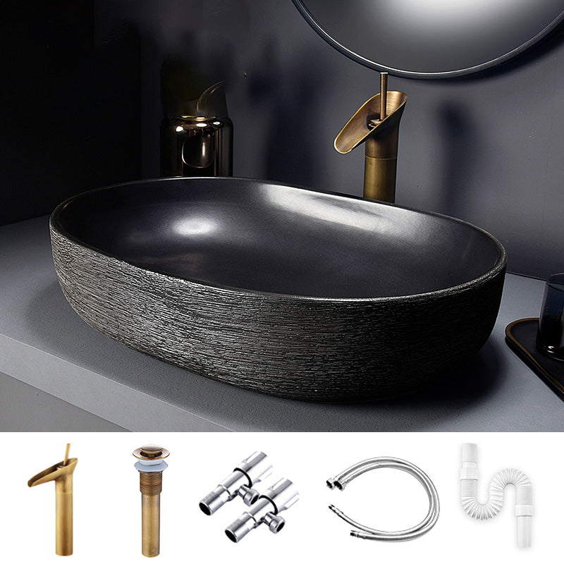 Modern Bathroom Sink Black Oval Ceramic Bathroom Sink with Faucet 23"L x 16"W x 6"H Sink with Faucet Clearhalo 'Bathroom Remodel & Bathroom Fixtures' 'Bathroom Sinks & Faucet Components' 'Bathroom Sinks' 'bathroom_sink' 'Home Improvement' 'home_improvement' 'home_improvement_bathroom_sink' 6926925