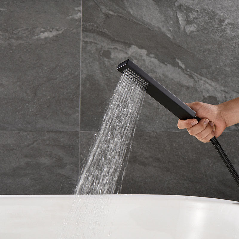 Freestanding Tub Filler Black Brass Single Knob Handle Fixed Tub Filler with Handshower Clearhalo 'Bathroom Remodel & Bathroom Fixtures' 'Bathtub Faucets' 'bathtub_faucets' 'Home Improvement' 'home_improvement' 'home_improvement_bathtub_faucets' 6952744