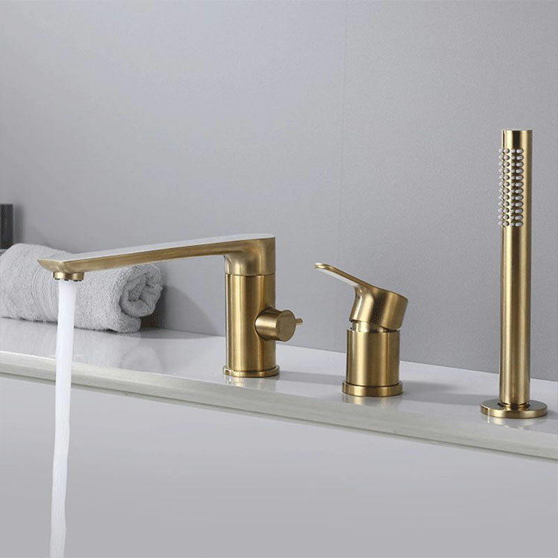 Deck Mounted Copper Roman Tub Faucet Low Arc Roman Tub Faucet Set with Hand Shower Gold Round 3 Hole Faucets Clearhalo 'Bathroom Remodel & Bathroom Fixtures' 'Bathtub Faucets' 'bathtub_faucets' 'Home Improvement' 'home_improvement' 'home_improvement_bathtub_faucets' 7011485