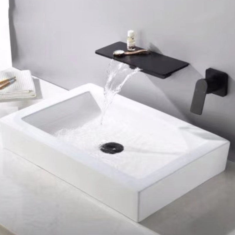 Contemporary Wall Mounted Metal Tub Filler Low Arc Waterfall Bathroom Faucet Black Rectangle Hand Shower Not Included Clearhalo 'Bathroom Remodel & Bathroom Fixtures' 'Bathtub Faucets' 'bathtub_faucets' 'Home Improvement' 'home_improvement' 'home_improvement_bathtub_faucets' 7011556