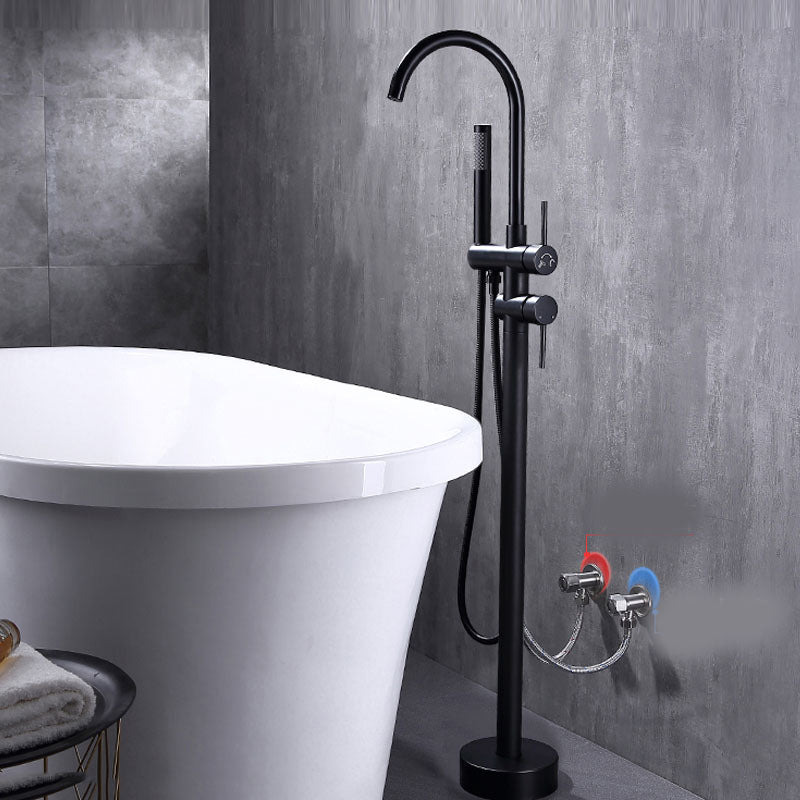Floor Mounted Copper Freestanding Tub Filler Freestanding High Arc Tub Metal Filler Trim Black Wall Clearhalo 'Bathroom Remodel & Bathroom Fixtures' 'Bathtub Faucets' 'bathtub_faucets' 'Home Improvement' 'home_improvement' 'home_improvement_bathtub_faucets' 7011572