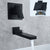 Contemporary Widespread Wall Mounted Bathroom Sink Faucet Swivel Spout Black Embedded Box Included Clearhalo 'Bathroom Remodel & Bathroom Fixtures' 'Bathroom Sink Faucets' 'Bathroom Sinks & Faucet Components' 'bathroom_sink_faucets' 'Home Improvement' 'home_improvement' 'home_improvement_bathroom_sink_faucets' 7062944