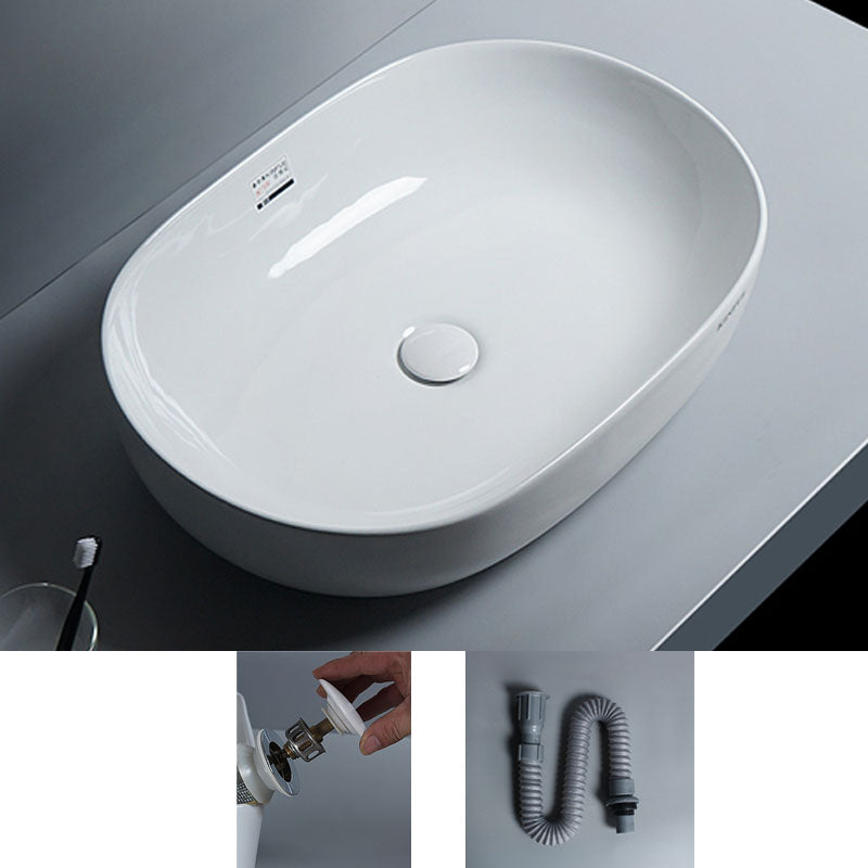 White Vessel Sink Faucet Porcelain Bathroom Sink with Pop-Up Drain 24"L x 17"W x 6"H Unavailiable Sink Clearhalo 'Bathroom Remodel & Bathroom Fixtures' 'Bathroom Sinks & Faucet Components' 'Bathroom Sinks' 'bathroom_sink' 'Home Improvement' 'home_improvement' 'home_improvement_bathroom_sink' 7111216