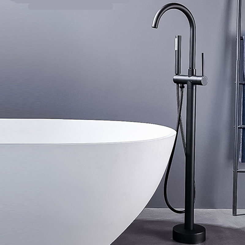 Brass Freestanding Tub Filler with Hand Shower Floor Mounted Bathroom Faucet Clearhalo 'Bathroom Remodel & Bathroom Fixtures' 'Bathtub Faucets' 'bathtub_faucets' 'Home Improvement' 'home_improvement' 'home_improvement_bathtub_faucets' 7183336