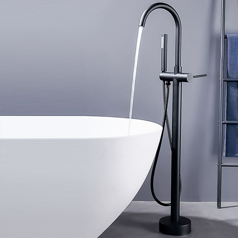 Brass Freestanding Tub Filler with Hand Shower Floor Mounted Bathroom Faucet Clearhalo 'Bathroom Remodel & Bathroom Fixtures' 'Bathtub Faucets' 'bathtub_faucets' 'Home Improvement' 'home_improvement' 'home_improvement_bathtub_faucets' 7183338
