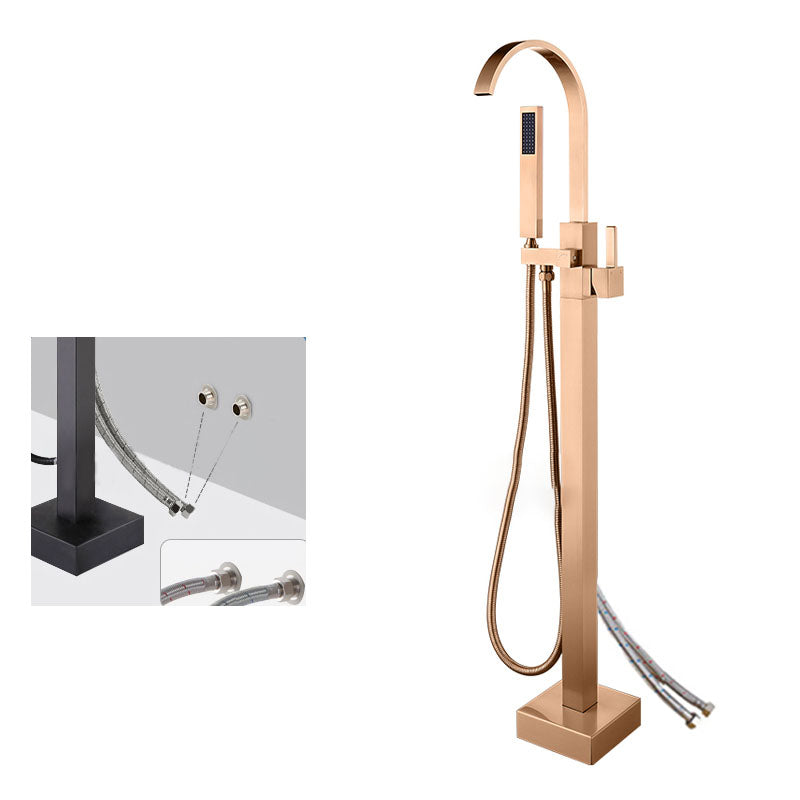 Contemporary Brass Freestanding Tub Filler with Hose Floor Mounted Bathroom Faucet Rose Gold Open Decoration Clearhalo 'Bathroom Remodel & Bathroom Fixtures' 'Bathtub Faucets' 'bathtub_faucets' 'Home Improvement' 'home_improvement' 'home_improvement_bathtub_faucets' 7196806