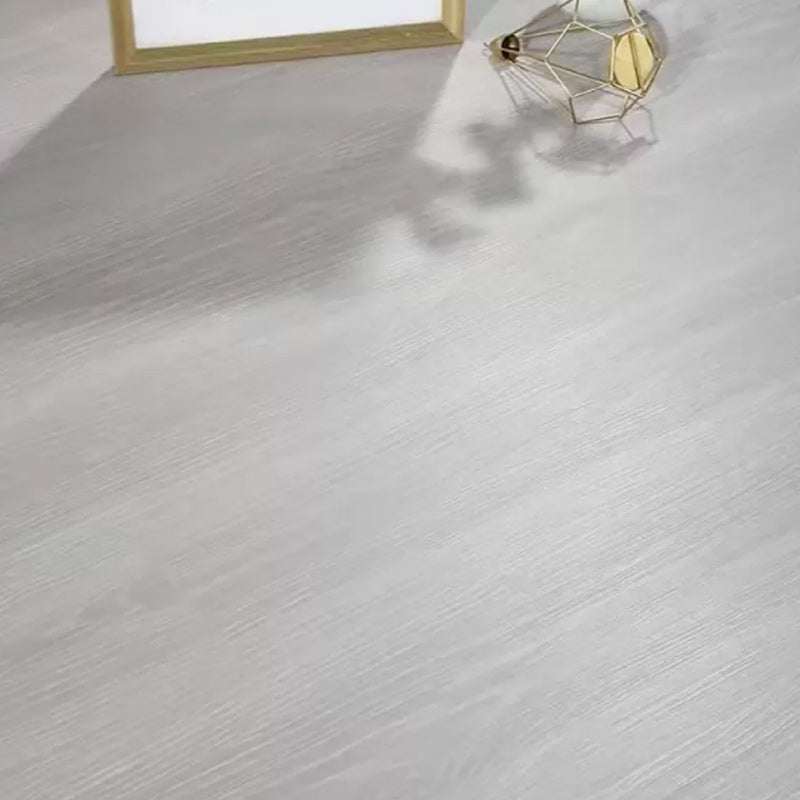 Grey Laminate Floor Slip Resistant Tongue and groove locking Laminate Light Gray Clearhalo 'Flooring 'Home Improvement' 'home_improvement' 'home_improvement_laminate_flooring' 'Laminate Flooring' 'laminate_flooring' Walls and Ceiling' 7205509