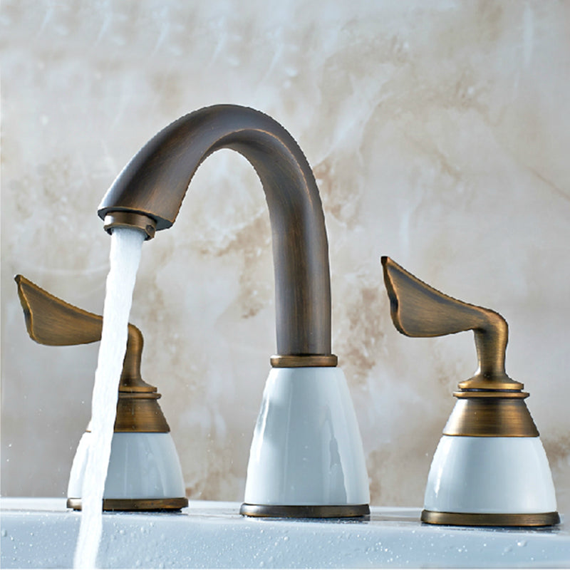 Widespread Bathroom Faucet 3 Holes Circular Vessel Sink Faucet Bronze High Arc Wide Handle Clearhalo 'Bathroom Remodel & Bathroom Fixtures' 'Bathroom Sink Faucets' 'Bathroom Sinks & Faucet Components' 'bathroom_sink_faucets' 'Home Improvement' 'home_improvement' 'home_improvement_bathroom_sink_faucets' 7205935