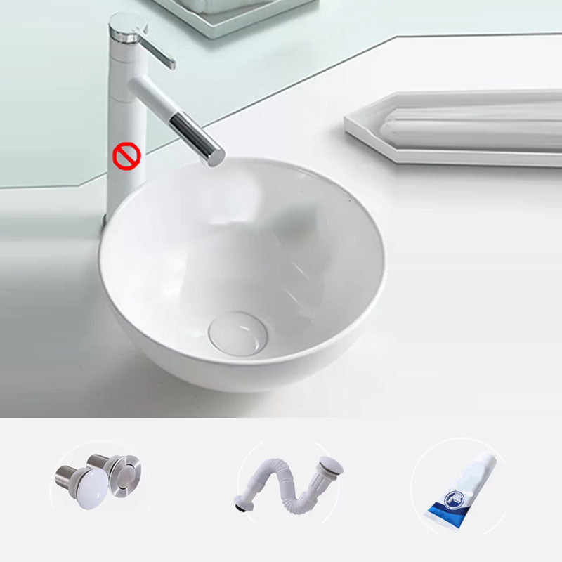 Bathroom Sink White Ceramic Faucet Single Handle Round Shape Sink Sink Clearhalo 'Bathroom Remodel & Bathroom Fixtures' 'Bathroom Sinks & Faucet Components' 'Bathroom Sinks' 'bathroom_sink' 'Home Improvement' 'home_improvement' 'home_improvement_bathroom_sink' 7208839