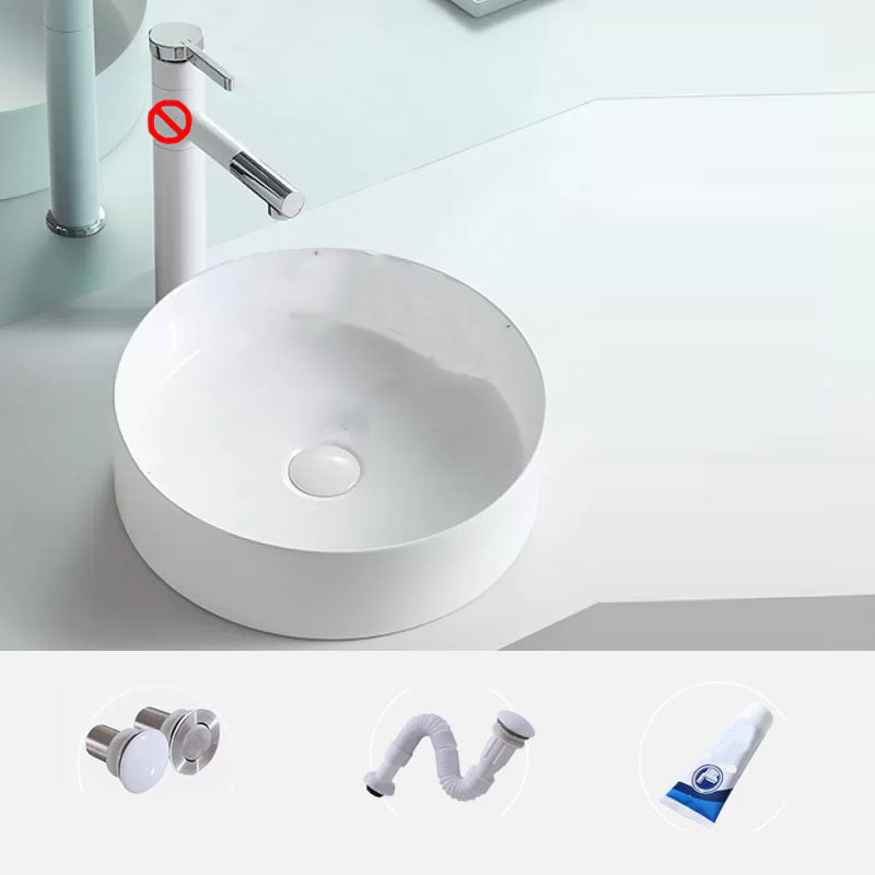Bathroom Sink White Ceramic Faucet Single Handle Round Shape Sink Sink Clearhalo 'Bathroom Remodel & Bathroom Fixtures' 'Bathroom Sinks & Faucet Components' 'Bathroom Sinks' 'bathroom_sink' 'Home Improvement' 'home_improvement' 'home_improvement_bathroom_sink' 7208842