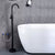 Brass Freestanding Tub Filler with Water Inlet Pipe Floor Mounted Bathroom Faucet Black Round Hand Shower Not Included Clearhalo 'Bathroom Remodel & Bathroom Fixtures' 'Bathtub Faucets' 'bathtub_faucets' 'Home Improvement' 'home_improvement' 'home_improvement_bathtub_faucets' 7209434