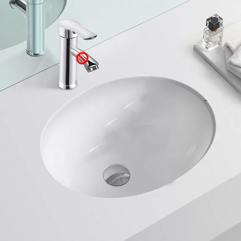 Bathroom Sink Ceramic White Round Anti-spill Sink with Faucet 15"L x 11"W x 6"H Sink Clearhalo 'Bathroom Remodel & Bathroom Fixtures' 'Bathroom Sinks & Faucet Components' 'Bathroom Sinks' 'bathroom_sink' 'Home Improvement' 'home_improvement' 'home_improvement_bathroom_sink' 7227347