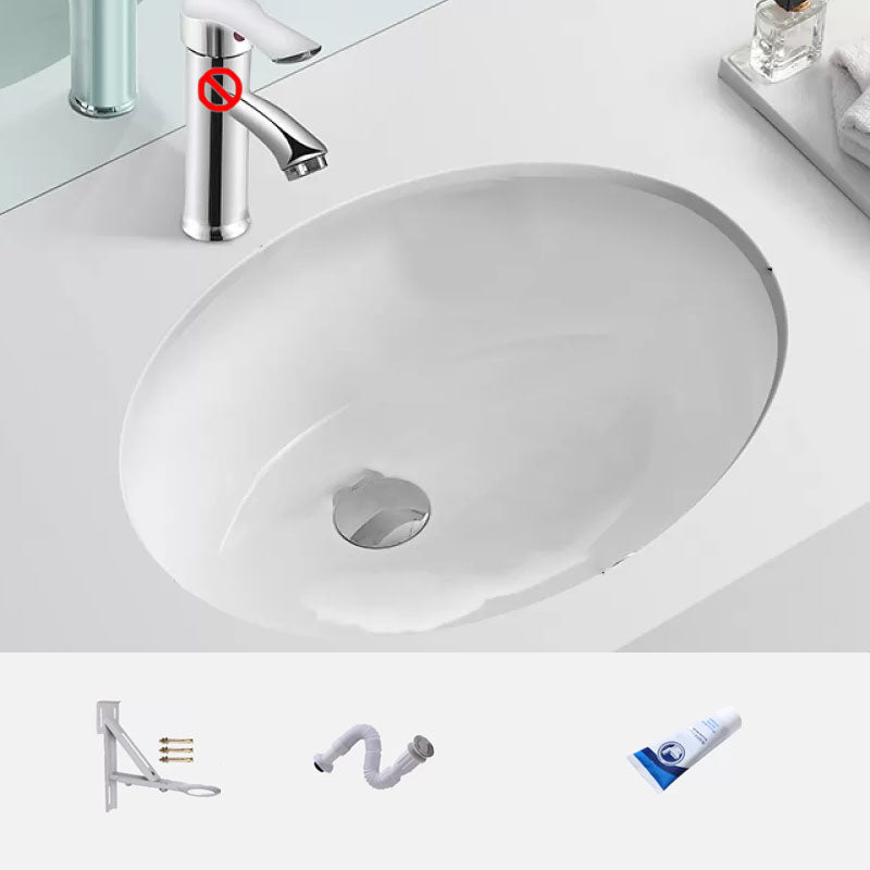 Bathroom Sink Ceramic White Round Anti-spill Sink with Faucet 17"L x 13"W x 6"H Sink with Drainage Components Clearhalo 'Bathroom Remodel & Bathroom Fixtures' 'Bathroom Sinks & Faucet Components' 'Bathroom Sinks' 'bathroom_sink' 'Home Improvement' 'home_improvement' 'home_improvement_bathroom_sink' 7227370