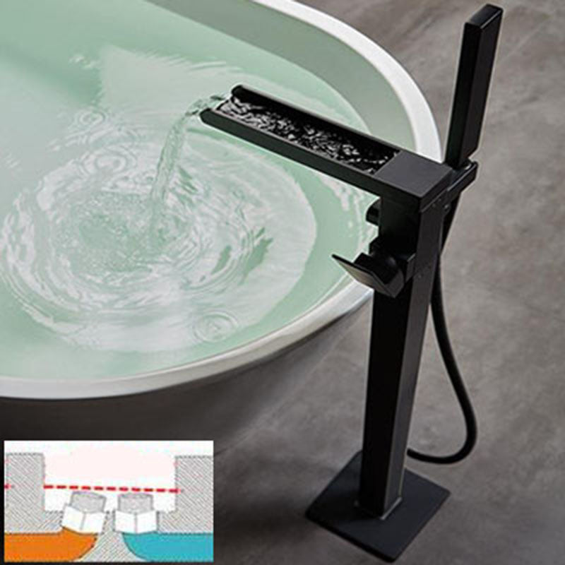 Brass Freestanding Tub Filler with Waterfall Spout Floor Mounted Bathroom Faucet Black Ground Clearhalo 'Bathroom Remodel & Bathroom Fixtures' 'Bathtub Faucets' 'bathtub_faucets' 'Home Improvement' 'home_improvement' 'home_improvement_bathtub_faucets' 7227584
