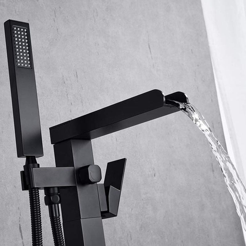 Brass Freestanding Tub Filler with Waterfall Spout Floor Mounted Bathroom Faucet Clearhalo 'Bathroom Remodel & Bathroom Fixtures' 'Bathtub Faucets' 'bathtub_faucets' 'Home Improvement' 'home_improvement' 'home_improvement_bathtub_faucets' 7227594