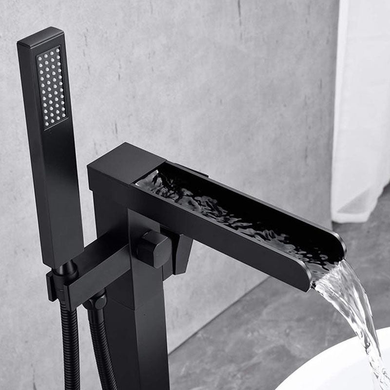 Brass Freestanding Tub Filler with Waterfall Spout Floor Mounted Bathroom Faucet Clearhalo 'Bathroom Remodel & Bathroom Fixtures' 'Bathtub Faucets' 'bathtub_faucets' 'Home Improvement' 'home_improvement' 'home_improvement_bathtub_faucets' 7227597