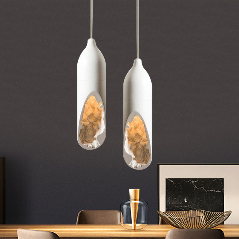 Pill-Shaped Resin Hanging Ceiling Light Farmhouse 1 Light Dining Room Pendant Lamp in White with Hollow-out Design Clearhalo 'Ceiling Lights' 'Industrial Pendants' 'Industrial' 'Middle Century Pendants' 'Pendant Lights' 'Pendants' 'Tiffany' Lighting' 728310