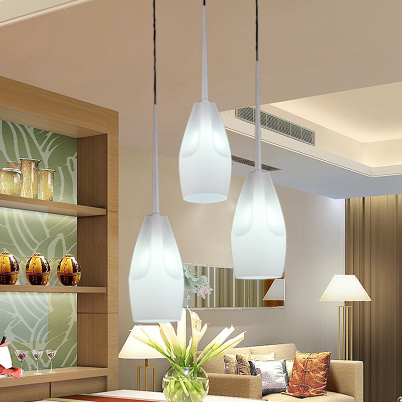 Waterdrop Suspension Light Modernist White Concave Glass 3 Heads Dining Room Cluster Pendant Lamp White Clearhalo 'Ceiling Lights' 'Glass shade' 'Glass' 'Modern Pendants' 'Modern' 'Pendant Lights' 'Pendants' Lighting' 730175