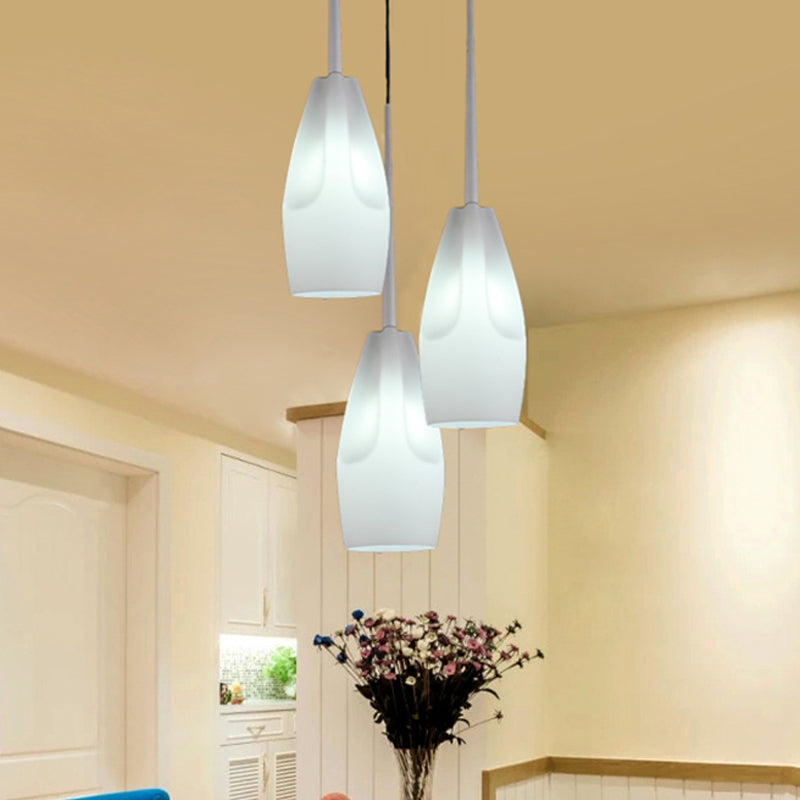 Waterdrop Suspension Light Modernist White Concave Glass 3 Heads Dining Room Cluster Pendant Lamp Clearhalo 'Ceiling Lights' 'Glass shade' 'Glass' 'Modern Pendants' 'Modern' 'Pendant Lights' 'Pendants' Lighting' 730176