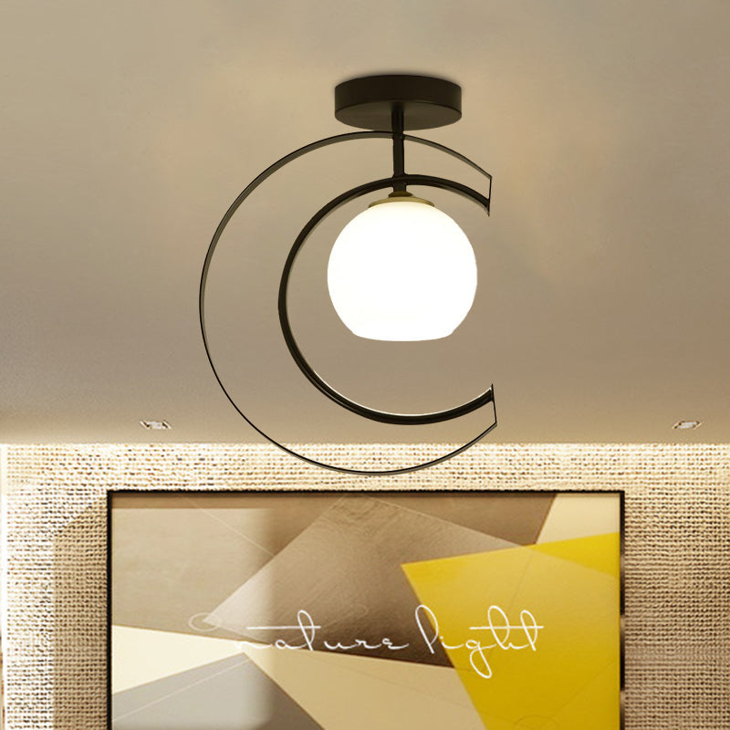 Modern Globe Semi Flush Light White Glass 1-Light Bedroom Ceiling Mounted Lamp in Black with Moon Iron Frame Black Clearhalo 'Ceiling Lights' 'Close To Ceiling Lights' 'Close to ceiling' 'Glass shade' 'Glass' 'Semi-flushmount' Lighting' 730519