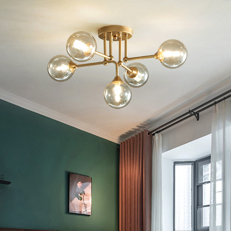 Modern 5 Lights Semi Flush Lighting Gold/Black and Gold Sphere Ceiling Lamp with Clear Glass Shade Clearhalo 'Ceiling Lights' 'Chandeliers' 'Close To Ceiling Lights' 'Close to ceiling' 'Glass shade' 'Glass' 'Semi-flushmount' Lighting' 731187