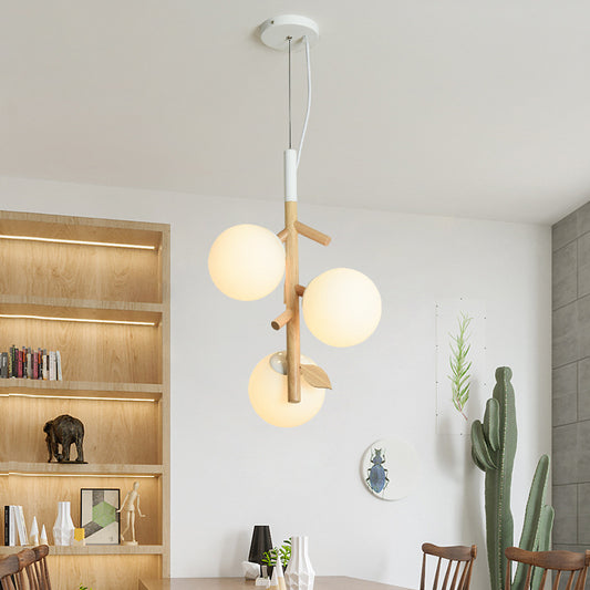 Modernist Ball Chandelier White Frosted Glass 2/3 Heads Dining Room Wood Ceiling Lamp with Vertical Branch Rod 3 White Clearhalo 'Ceiling Lights' 'Chandeliers' 'Glass shade' 'Glass' 'Modern Chandeliers' 'Modern' Lighting' 731209