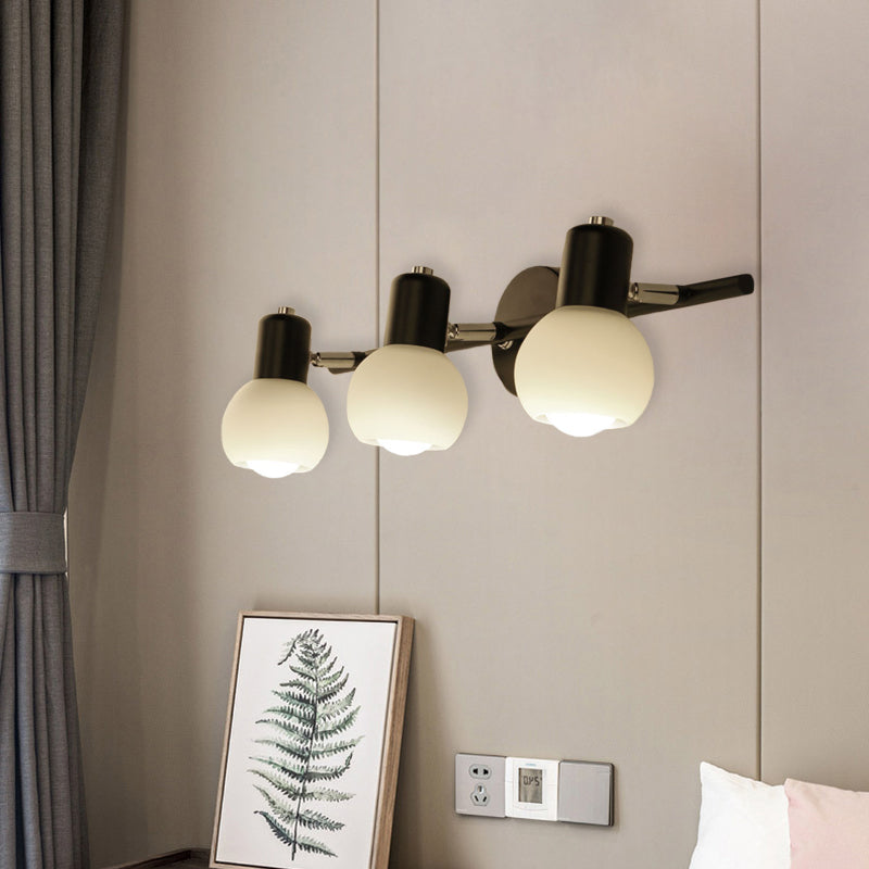 Modo Sconce Lighting Minimalist Opal Glass 2/3-Bulb Study Room Wall Mount Lamp in Black with Linear Design Clearhalo 'Cast Iron' 'Glass' 'Industrial' 'Modern wall lights' 'Modern' 'Tiffany' 'Traditional wall lights' 'Wall Lamps & Sconces' 'Wall Lights' Lighting' 731376