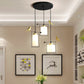 Cylinder Dining Room Cluster Pendant Cream/Smoke Gray Glass 3 Bulbs Modernism Suspension Lamp with Gold Bird Deco Clearhalo 'Ceiling Lights' 'Chandeliers' 'Glass shade' 'Glass' 'Modern Pendants' 'Modern' 'Pendant Lights' 'Pendants' Lighting' 731492