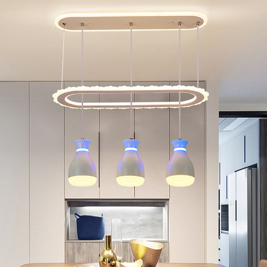 Wine Jar Dining Room Multi Light Pendant Acrylic 3 Heads Minimalism LED Ceiling Hang Fixture with Oval Ring Shelf in White/Black White Clearhalo 'Ceiling Lights' 'Modern Pendants' 'Modern' 'Pendant Lights' 'Pendants' Lighting' 731837
