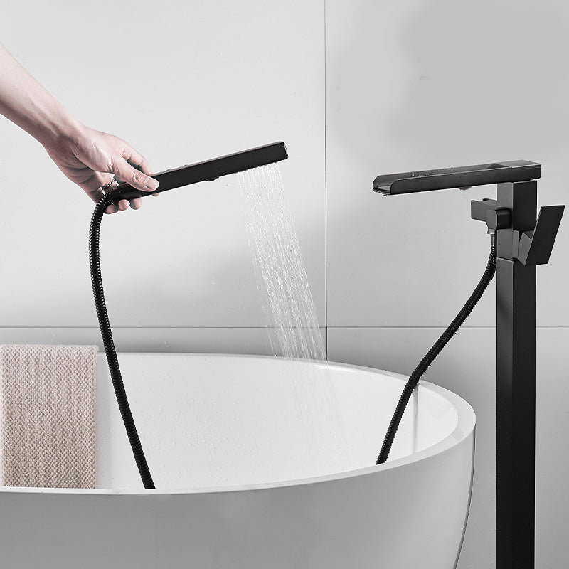 Modern Freestanding Tub Filler Trim Brass Floor Mounted with Handles Tub Faucet Clearhalo 'Bathroom Remodel & Bathroom Fixtures' 'Bathtub Faucets' 'bathtub_faucets' 'Home Improvement' 'home_improvement' 'home_improvement_bathtub_faucets' 7329604