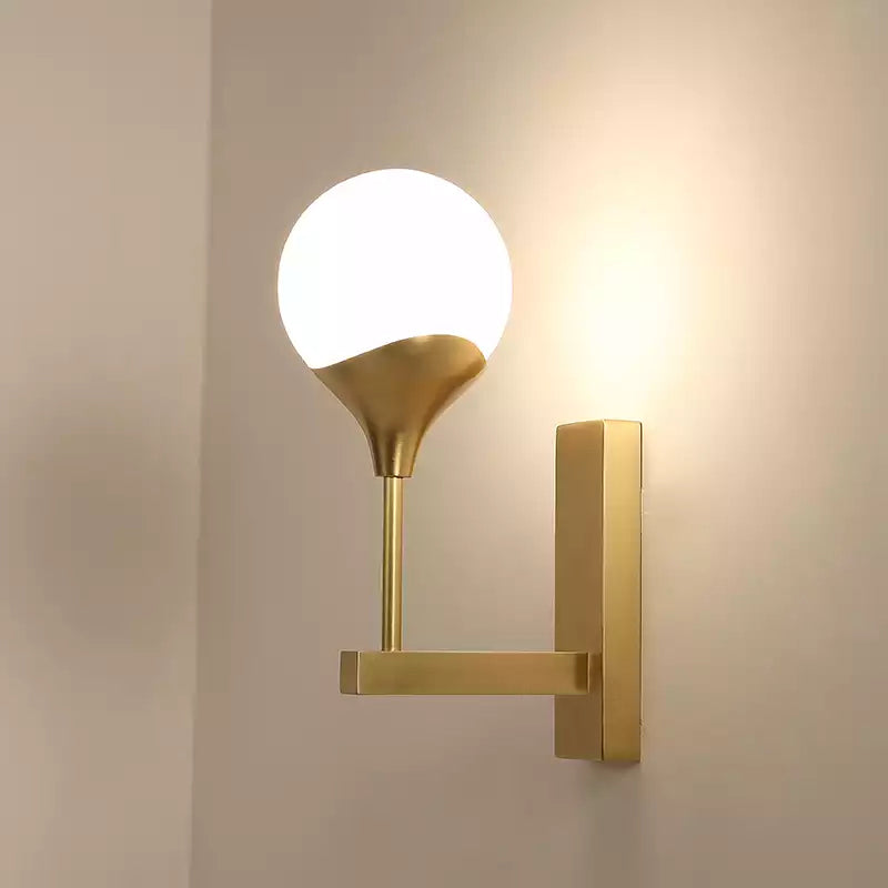 1 Bulb Bedroom Wall Light Minimal Brass Finish Wall Sconce with Globe Cream Glass Shade Clearhalo 'Cast Iron' 'Glass' 'Industrial' 'Modern wall lights' 'Modern' 'Tiffany' 'Traditional wall lights' 'Wall Lamps & Sconces' 'Wall Lights' Lighting' 734542