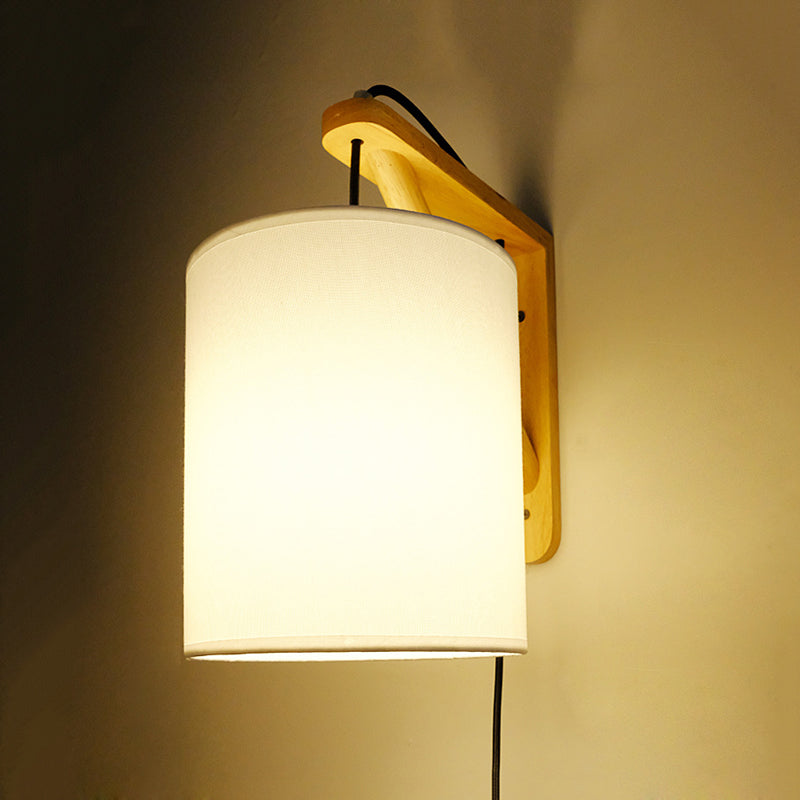 White Cylindrical Fabric Wall Light Sconce Japanese Style 1-Bulb Wood Plug In Wall Mount Lamp Clearhalo 'Modern wall lights' 'Modern' 'Wall Lamps & Sconces' 'Wall Lights' Lighting' 734696