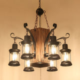 Lantern Clear Glass Chandelier Lighting Farmhouse 6 Lights Dining Room Hanging Lamp in Black with Rectangle Wood Deco Clearhalo 'Cast Iron' 'Ceiling Lights' 'Chandeliers' 'Industrial Chandeliers' 'Industrial' 'Metal' 'Middle Century Chandeliers' 'Rustic Chandeliers' 'Tiffany' Lighting' 734955