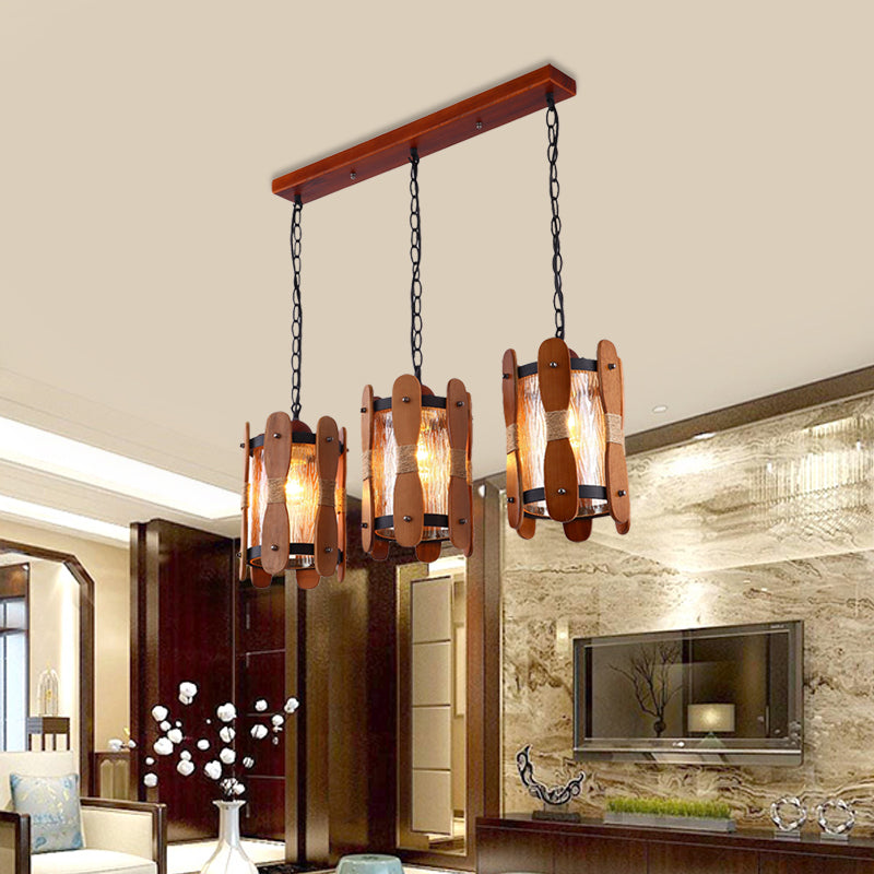 Cylinder Yellow Water Glass Cluster Pendant Retro 3 Heads Dining Room Hanging Light Kit in Brown with Wood Panel Design Brown Clearhalo 'Ceiling Lights' 'Glass shade' 'Glass' 'Industrial Pendants' 'Industrial' 'Middle Century Pendants' 'Pendant Lights' 'Pendants' 'Tiffany' Lighting' 735124