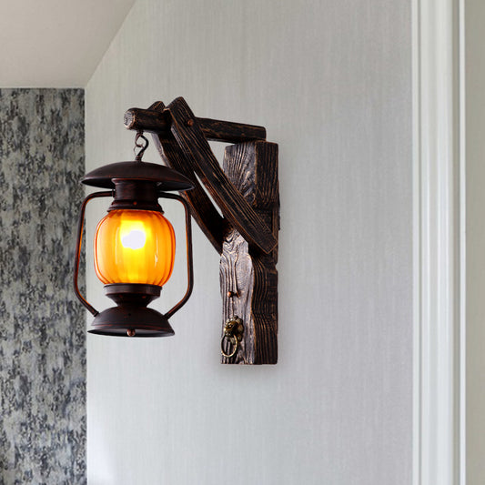 Amber Glass Lantern Wall Light Sconce Warehouse 1 Head Bedroom Wall Mount Lamp in Black with Wood Backplate Clearhalo 'Art deco wall lights' 'Cast Iron' 'Glass' 'Industrial wall lights' 'Industrial' 'Middle century wall lights' 'Modern' 'Rustic wall lights' 'Tiffany' 'Traditional wall lights' 'Wall Lamps & Sconces' 'Wall Lights' Lighting' 735165